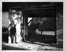 The man in front of the homestead