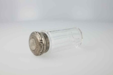 Round glass container with screw cap, withmonogram MG