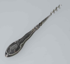 Stalowy korkociąg z z monogramem MG